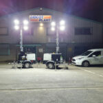 Two SMC TL90 Evolve Mobile Tower Lights in use in the Didcot Plant forecourt at night