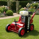 A Camon LS42 Scarifier on a lawn of green grass.